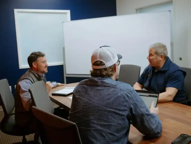 leadership in a meeting with a franchisee